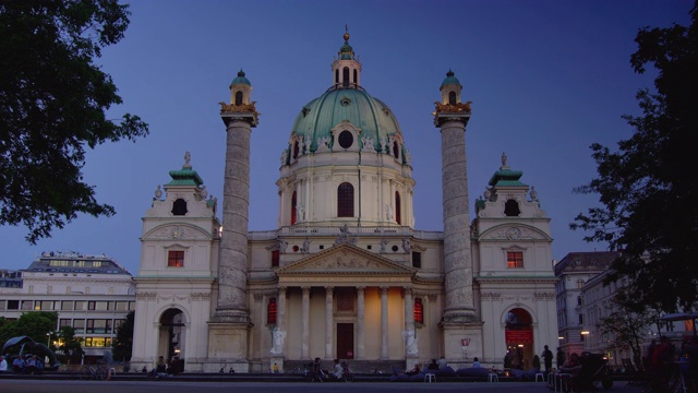 奥地利维也纳卡尔斯科奇教堂，日落时分的夜晚，时光流逝的景象视频素材