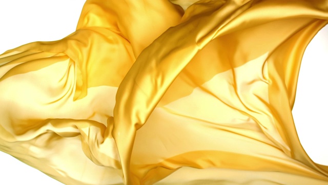金色金属丝质织物在超慢的动作中横向流动和摆动，近距离，白色背景视频素材