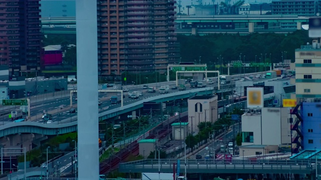 一段时间的城市街道在有明东京的城市小镇白天的长镜头视频素材