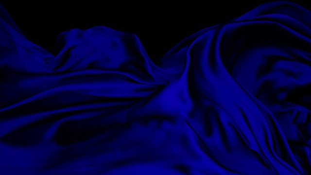 金属色的深蓝色丝质织物在超慢的动作中横向流动和摆动，近距离，黑色背景视频素材