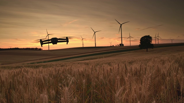 WS无人机拍摄的麦田和风力涡轮机视频素材