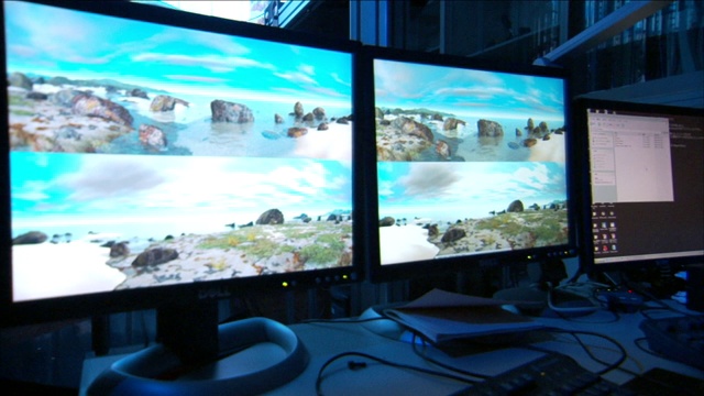 计算机监视器显示海岸的景象。视频下载