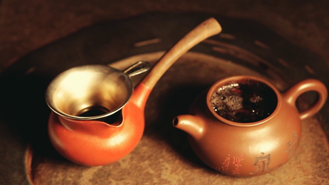 茶壶热水石背景高清镜头视频素材