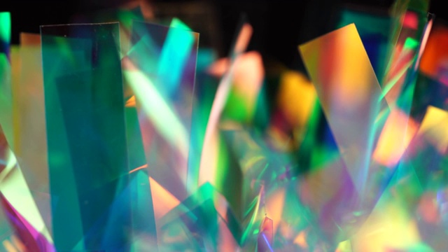 全息背景。晶体和棱镜的表面。闪亮的亮点和彩虹的颜色视频素材