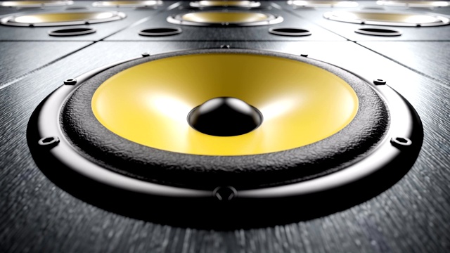 特写音频扬声器与黄色膜播放有节奏的音乐循环视频素材