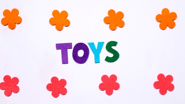 玩具这个词是用跳舞的字母写的。五彩缤纷的字体。视频下载