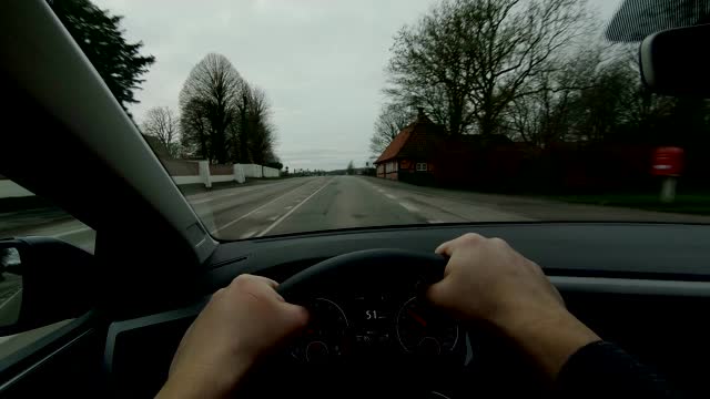 丹麦洛兰POV人车辆日驾驶在汽车仪表盘内视频素材