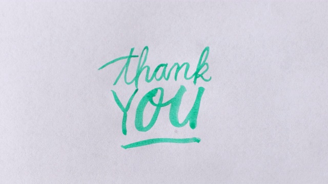 用手把“谢谢”字写在另一个字的上面视频素材