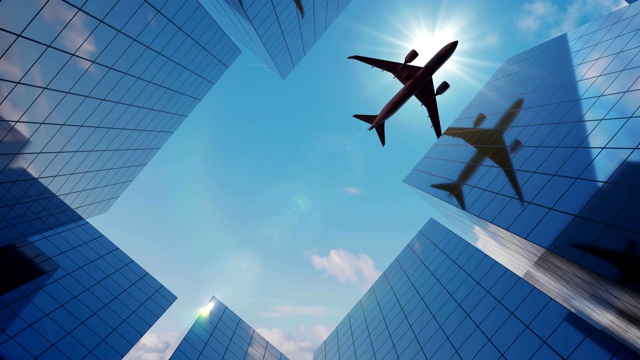 飞机在城市的建筑物和摩天大楼上飞行的动画。视频素材