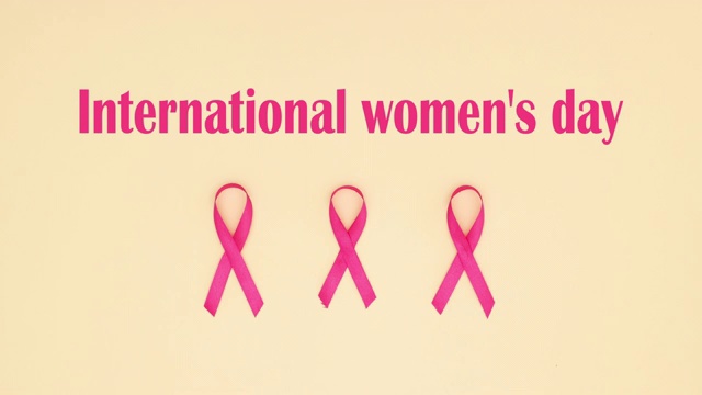 国际妇女节上面出现三条粉色丝带-停止运动视频下载