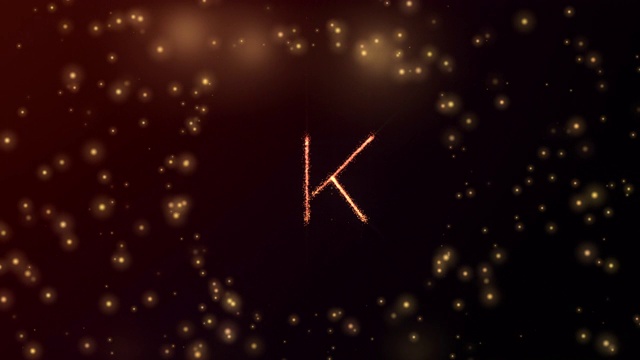 发光粒子形成字母K与球开放和红色发光背景在3D和淡出视频素材