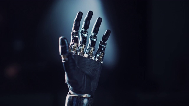 现代仿人机器人手臂工作，手掌张开。精巧的机械奇迹，高科技假体来帮助在一次事故中失去手的残疾人视频素材