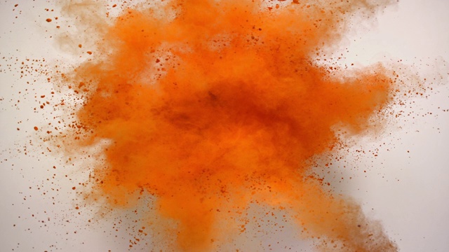 橙色粉底粉底近距离超慢镜头向镜头爆炸视频下载