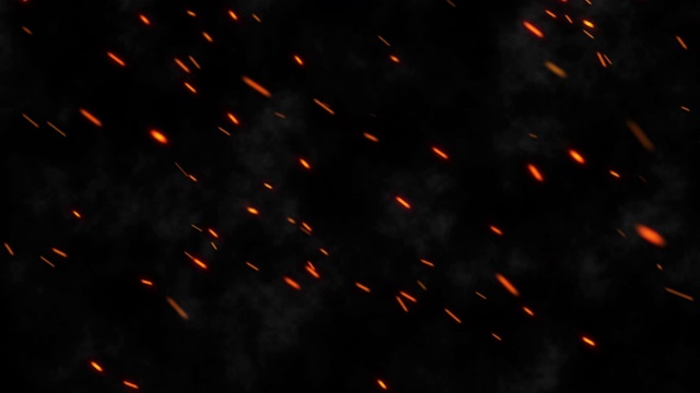 夜里有许多明亮的火花从火中飞溅出来视频素材