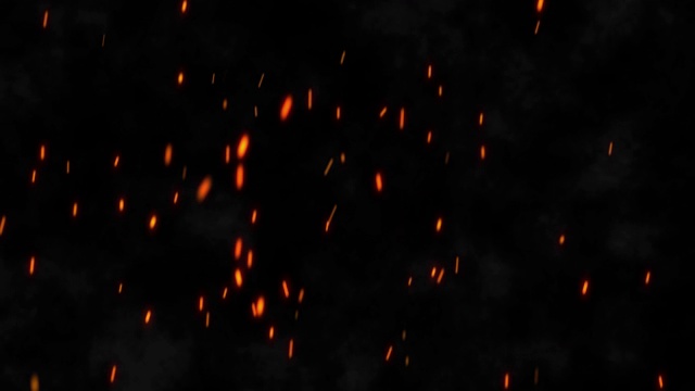 现实燃烧的热火花在夜空中从大火升起。4K视频素材