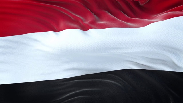 也门国旗迎风飘扬，织物质地细腻。无缝循环视频下载