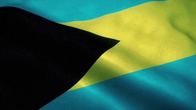 在风中飘扬的巴哈马群岛旗帜。巴哈马群岛的标志无缝循环动画。4 k视频下载