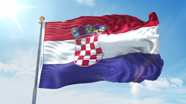 克罗地亚国旗在深蓝色的天空中迎风飘扬。国家主题，国际理念。3D渲染无缝循环4K视频素材