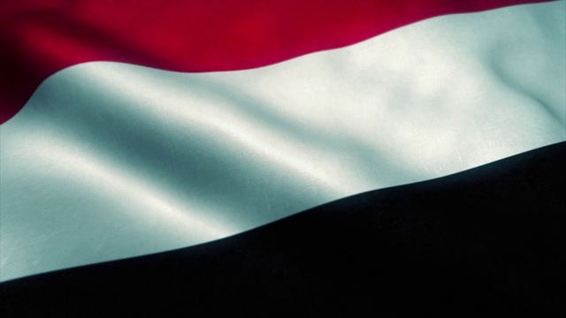 迎风飘扬的也门国旗。也门国旗。也门标志无缝循环动画。4 k视频下载