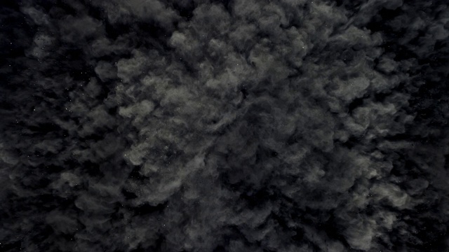 一个表面充满了木炭灰色的粉末喷向相机和跳跃的烟雾纹理近距离和超级慢的动作视频素材