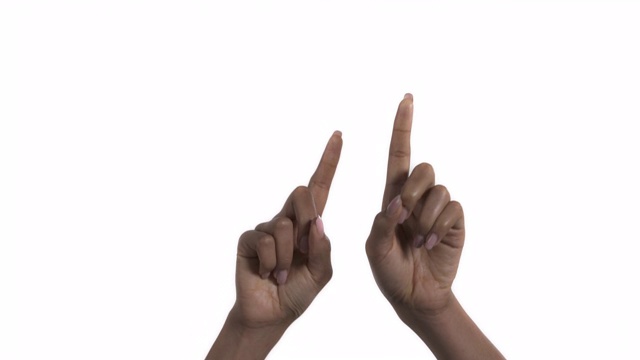 女人用食指向上指。肢体语言和手势概念。孤立，在白色背景上。两只手的姿势。视频素材