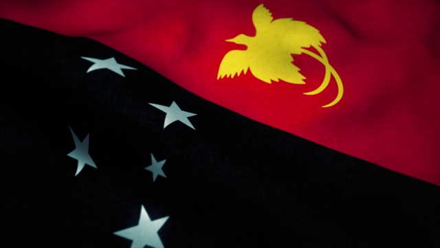 在风中飘扬的巴布亚新几内亚国旗。巴布亚新几内亚国旗。巴布亚新几内亚的标志无缝循环动画。4 k视频下载