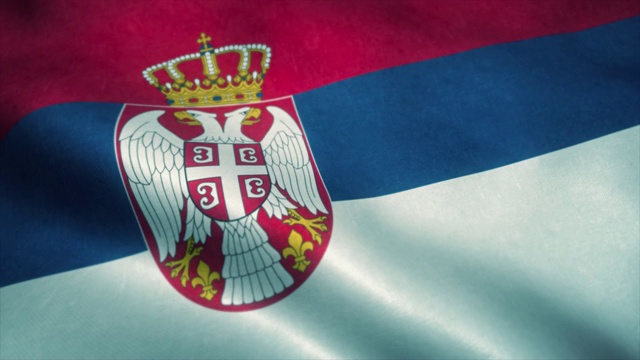 塞尔维亚国旗在风中飘扬。塞尔维亚国旗。塞尔维亚标志无缝循环动画。4 k视频下载