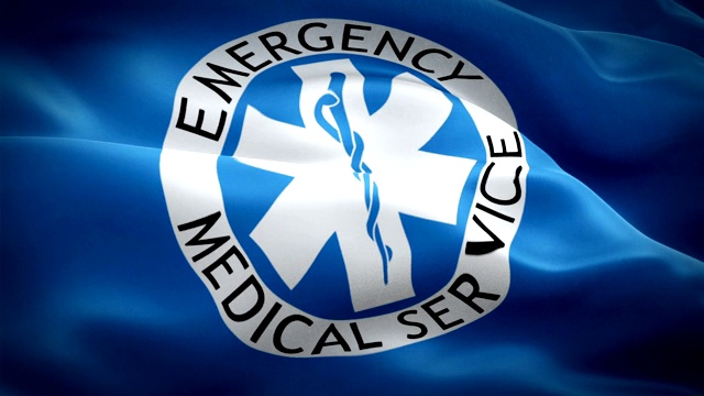 911医疗服务旗在风中飘扬。EMS紧急医疗保健标志背景。紧急医疗服务旗循环特写1080p全高清镜头EMS视频下载