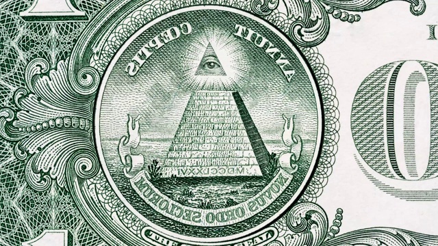 创意4k视差视频的细节1美元纸币与一个旋转的圆形金字塔和眼睛在顶部。视频素材