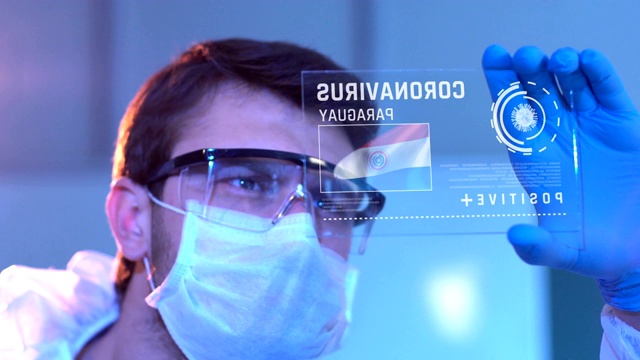 研究人员正在研究巴拉圭的冠状病毒结果。实验室数字屏幕上的巴拉圭国旗视频下载