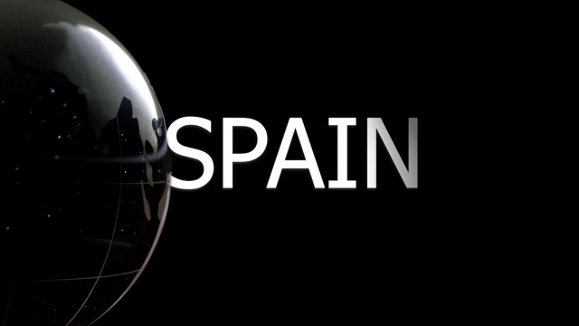 玻璃球在黑色背景前旋转，西班牙剧本出现视频素材