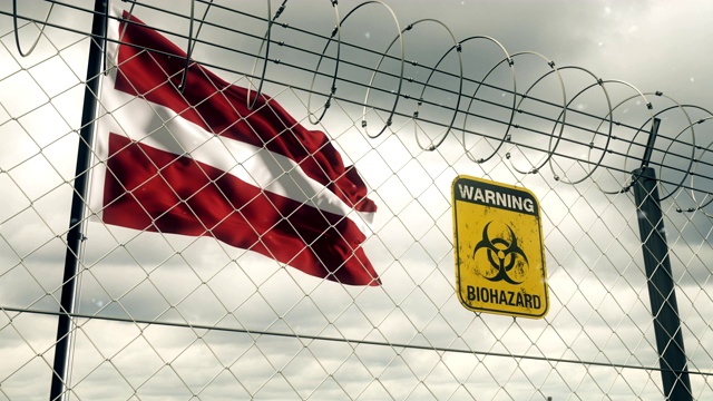 带有生物危害警告检疫标志的拉脱维亚国旗。Loopable。视频素材