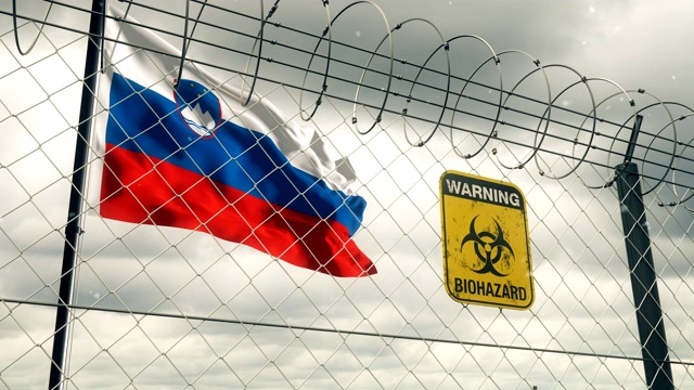 斯洛文尼亚国旗上有生物危害标志，警告检疫隔离。Loopable。视频素材
