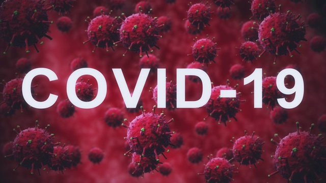 COVID-19字样在绿色细菌或病毒背景下流畅呈现，细胞缓慢移动和旋转视频素材