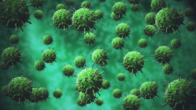 绿色细菌或COVID-19病毒、细胞缓慢移动和旋转、分离、致病细胞概念视频素材