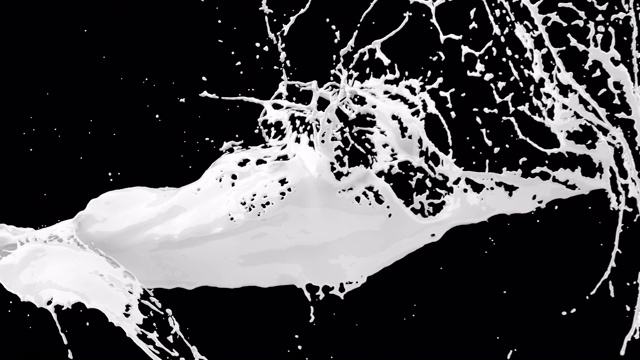慢动作近距离液体牛奶飞溅概念构思。3D动画与阿尔法通道。4k视频素材