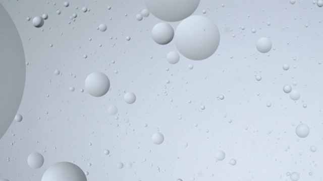 壁纸背景白色气泡球。浮在液体上的油滴，抽象的智能手机主页屏保，主题。科学实验室实验进展，光效果3D纯视频素材