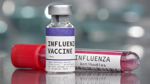 流感疫苗和抗体在医学实验室视频下载