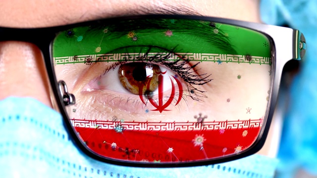 医生脸上的眼镜画着伊朗国旗的颜色视频下载