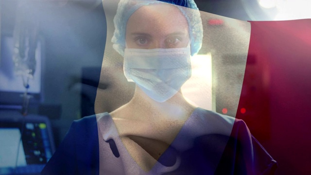 在新冠肺炎大流行期间，以医护人员为背景的法国国旗动画视频素材
