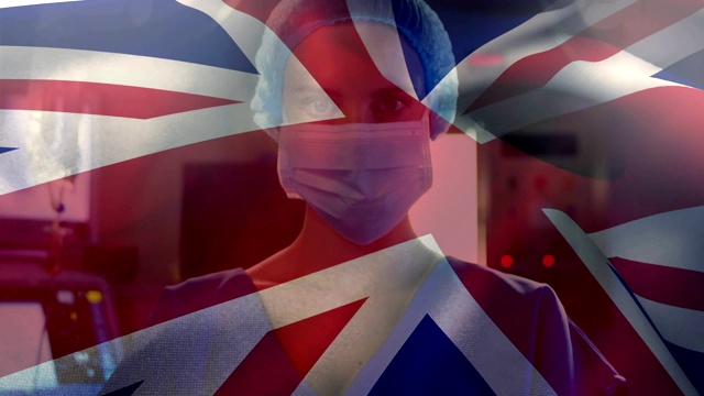 在冠状病毒大流行期间，以医护人员为背景的英国国旗动画视频素材