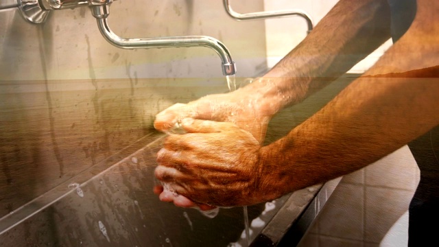 一个男人站在水槽边用肥皂洗手的动画视频下载