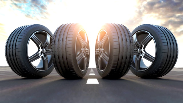 路上有四个汽车轮子。汽车服务，车间或改变汽车轮胎的概念。三维动画视频素材