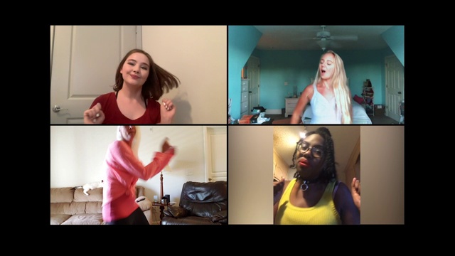 四名年轻女子通过视频电话随着她们最喜欢的歌曲跳舞。视频下载