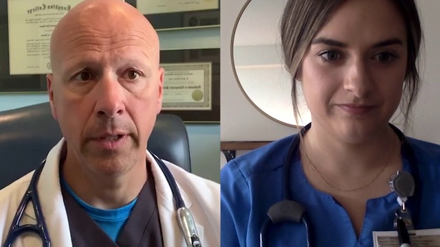 男医生与年轻女性医护人员进行视频通话视频素材