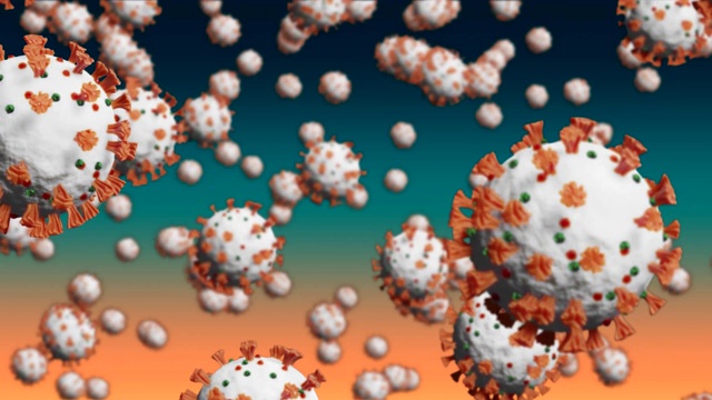新冠病毒的宏细胞在绿色到橙色渐变背景上扩散的动画视频素材
