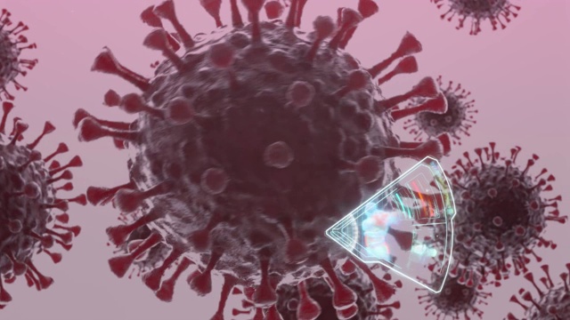 在浅粉色背景下旋转的冠状病毒的紫色尖状物图像-特写视频下载