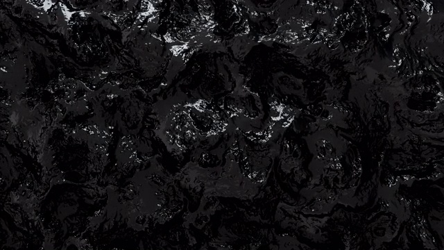沸腾液体移动的黑色表面视频素材
