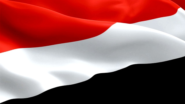 也门国旗运动循环视频在风中飘扬。现实的也门国旗背景。也门萨那旗帜循环特写1080p全高清1920X1080镜头。也门中东国家国旗镜头视频为电影，新闻视频下载