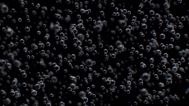 美丽的二氧化碳气泡在水中移动缓慢的微距无缝黑白背景。循环3d动画的特写质量气泡与自由度模糊。视频素材